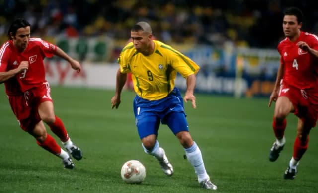 Football match action on the pitch